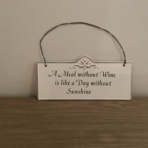 tekstbordje “A meal without wine…”