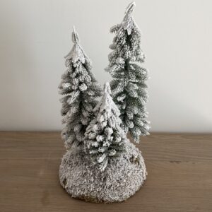 Trio van kerstbomen